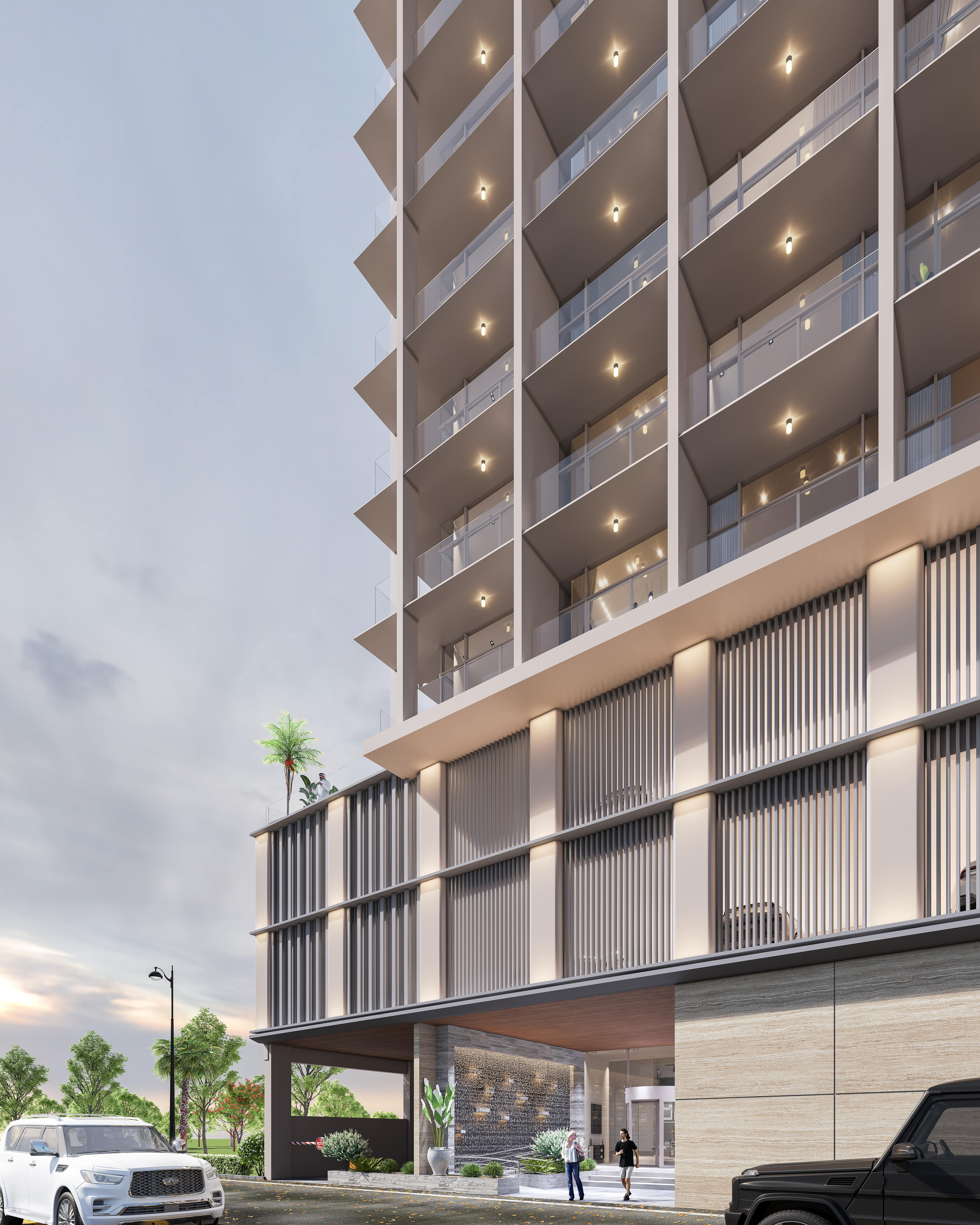 Hyde Walk By Imtiaz A modern high-rise building with balconies, featuring a welcoming entrance and two people outside.